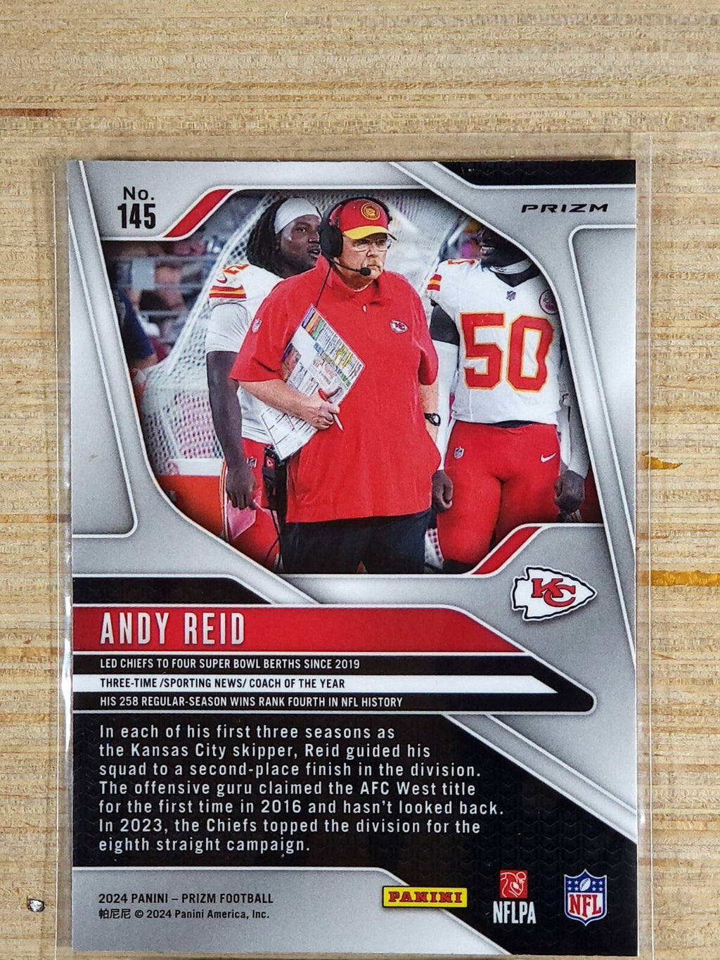 2024 Panini Prizm #145 Andy Reid Orange Disco