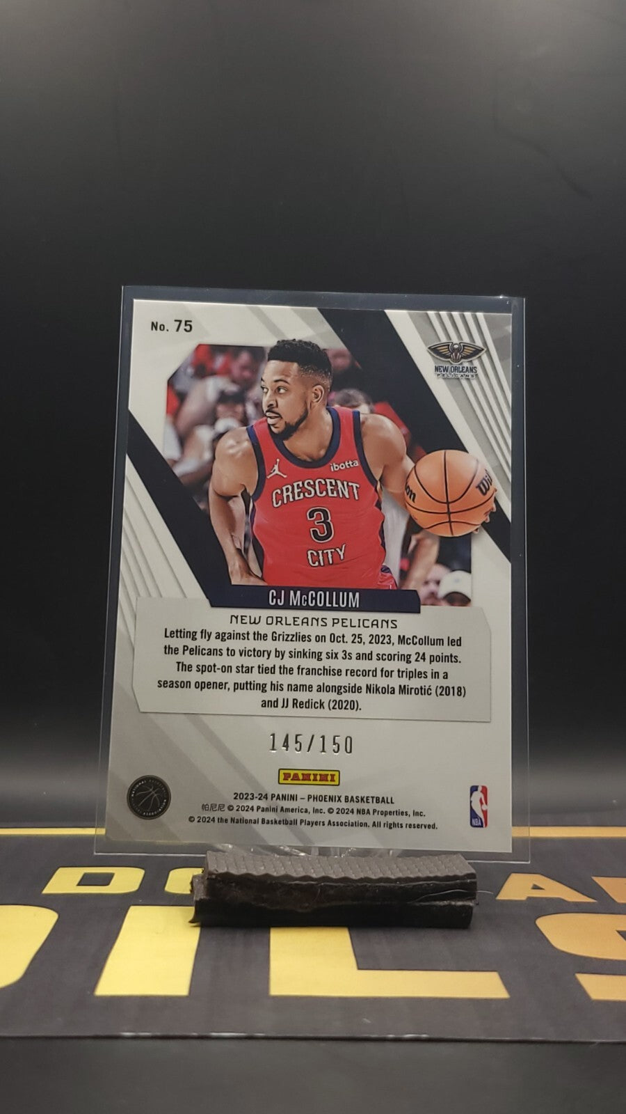 2023-24 Panini Phoenix - #75 C.J. McCollum White Lazer 145/150
